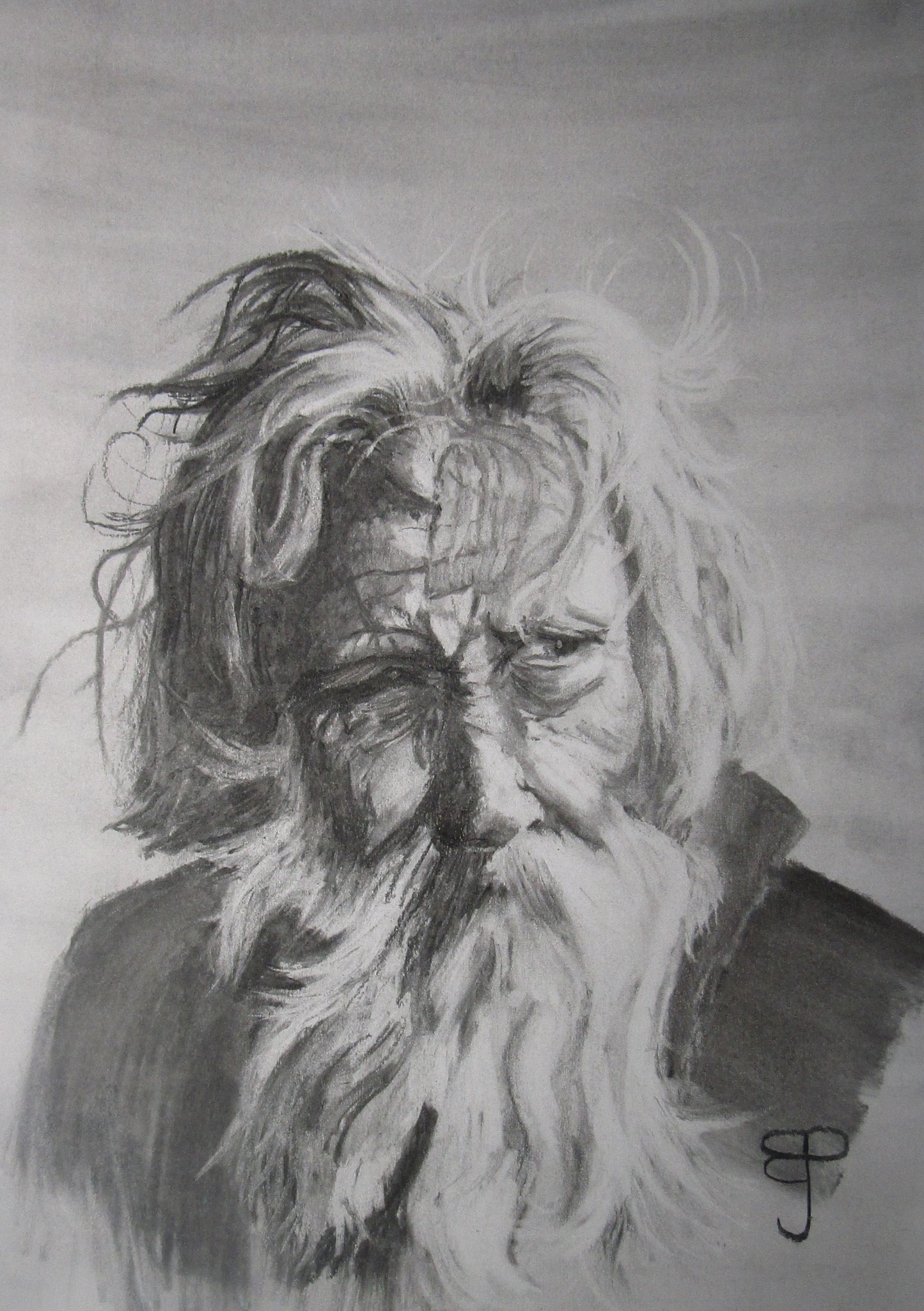 A charcoal portrait of an old bearded man with dishevelled hair