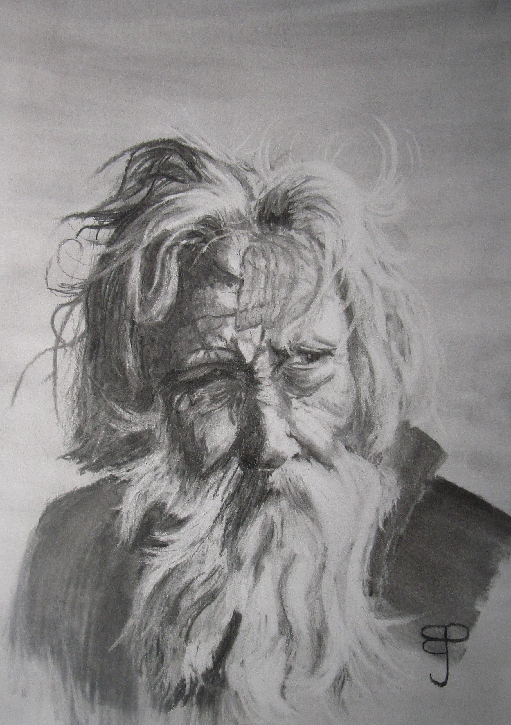 A charcoal portrait of an old bearded man with dishevelled hair