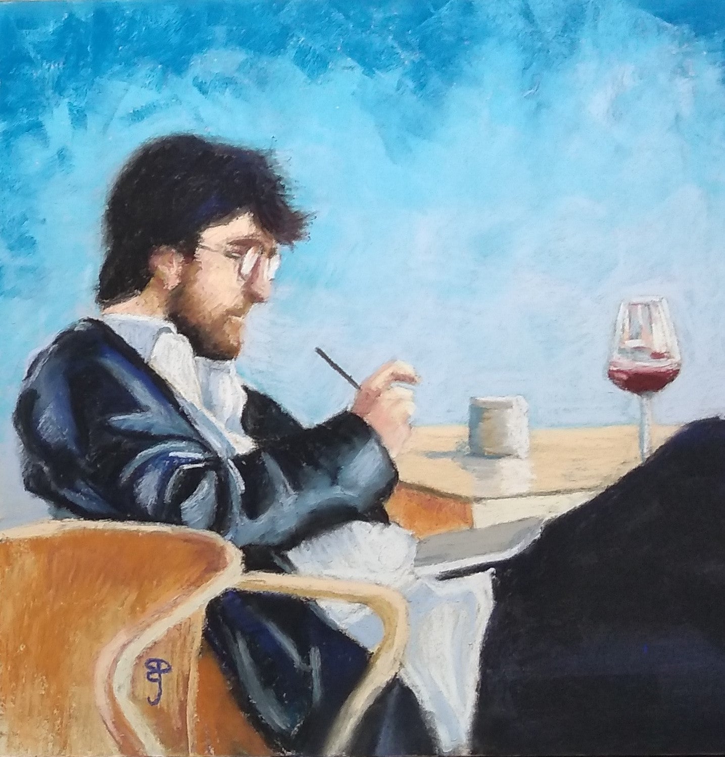A pastel painting by Brian Prangle of a bearded young man in leather jacket making notes at a cafe table with a glass of redwine